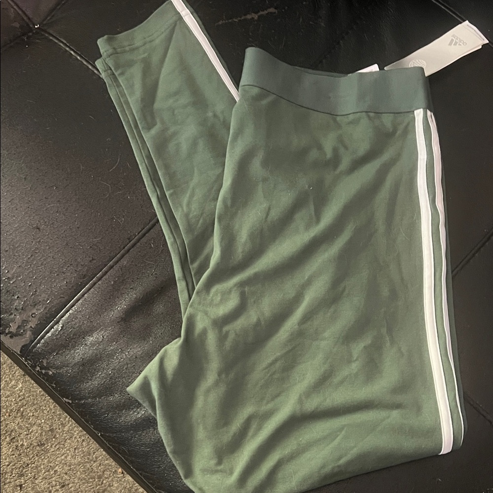 adidas woman plus adidas joggers green and white stripe